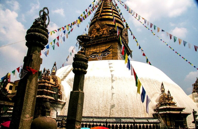 Stupa with Buddha eyes and prayer flags at Swayambhunath, the Monkey Temple in Kathmandu, Nepal.