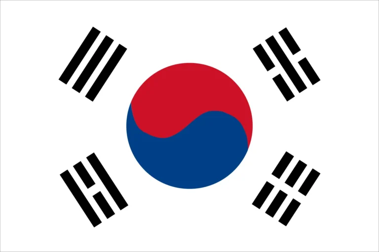 Flag of South Korea with a white background, red and blue yin-yang symbol in the center, and four sets of black trigrams at the corners.